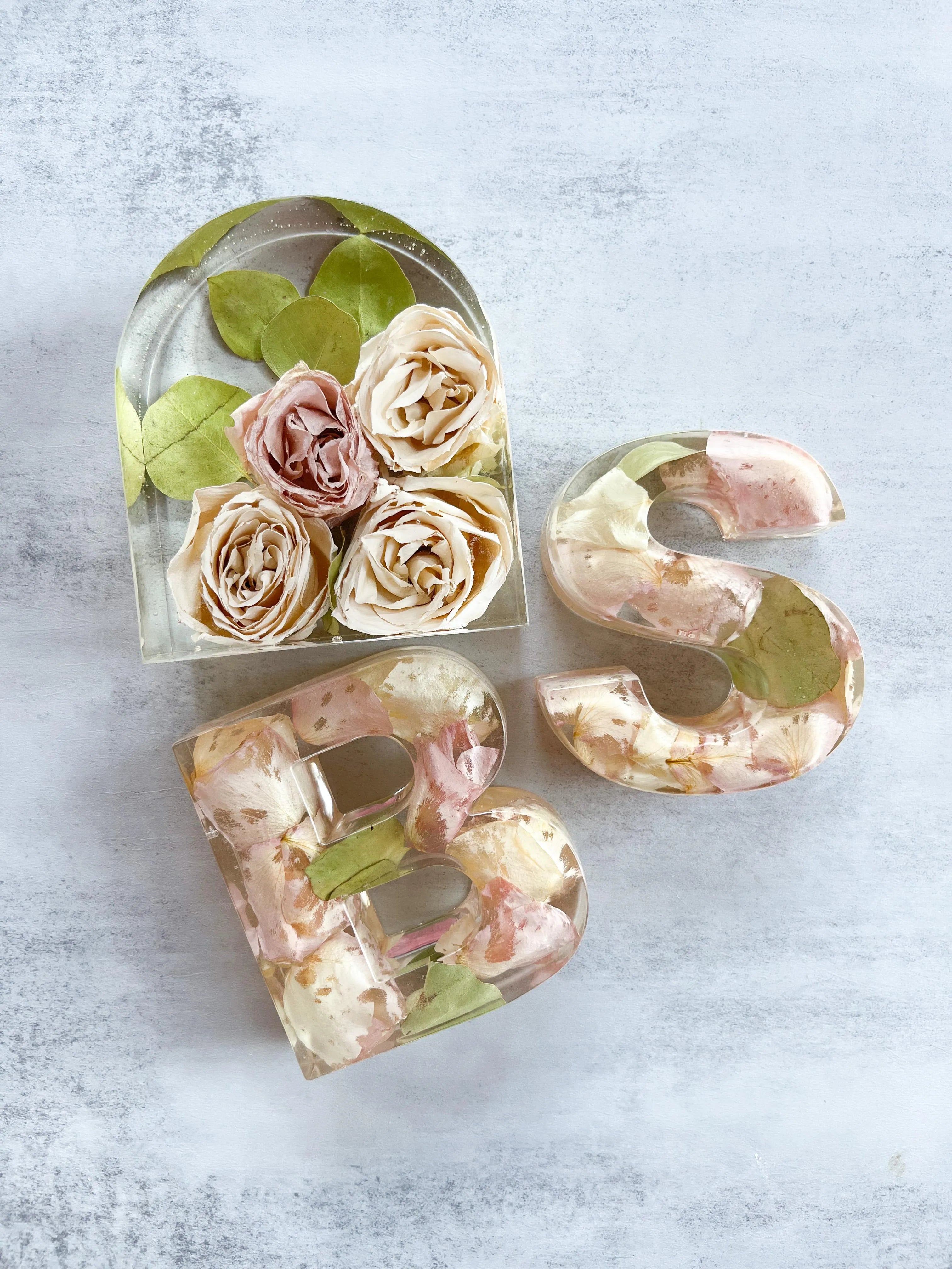 Custom Resin Floral Preservation Letter displaying wedding flowers in a personalized monogram shape.