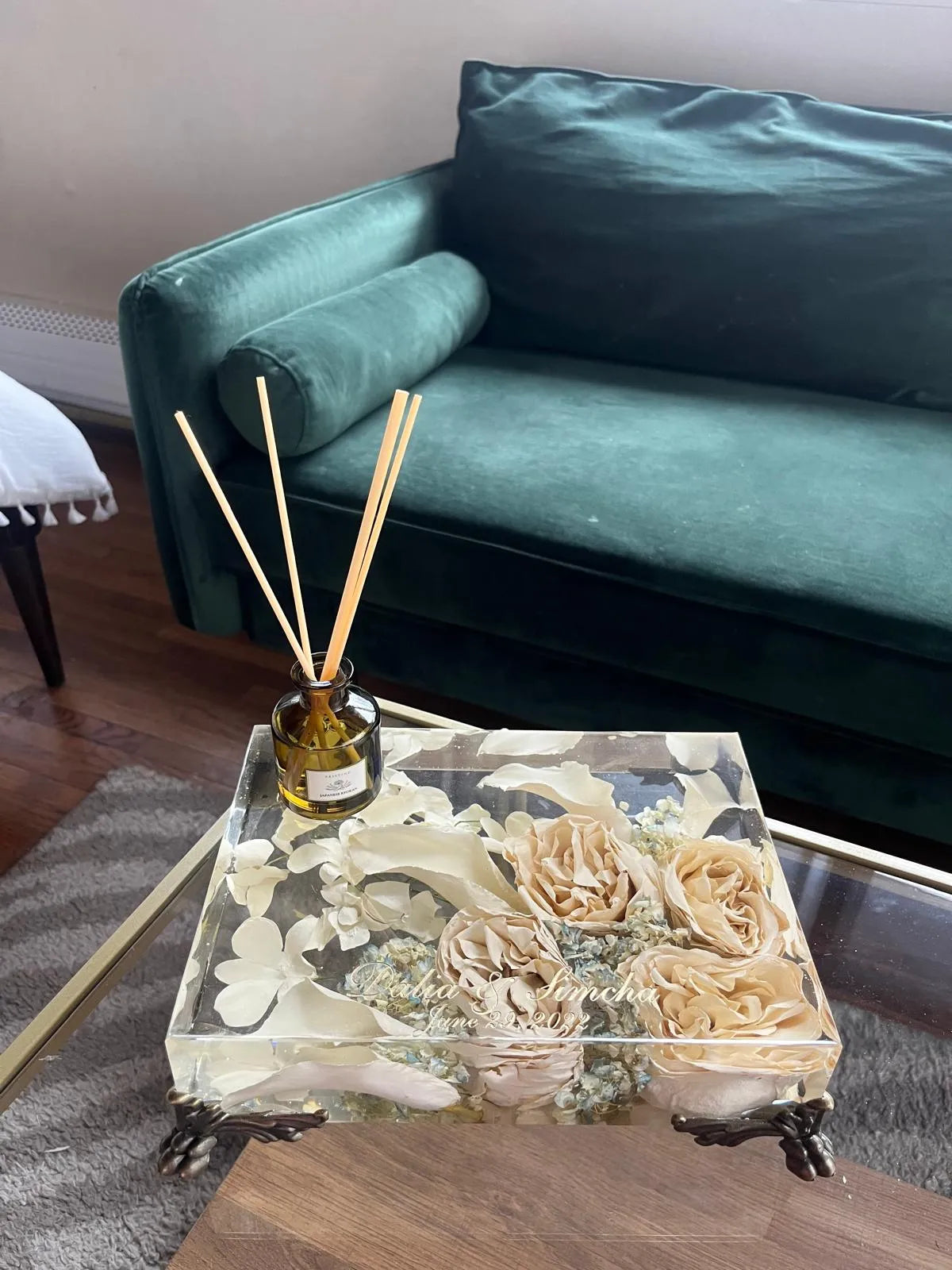 Resin Floral Preservation Vanity Tray with brass claw feet holding bridal jewelry alongside preserved wedding flowers.