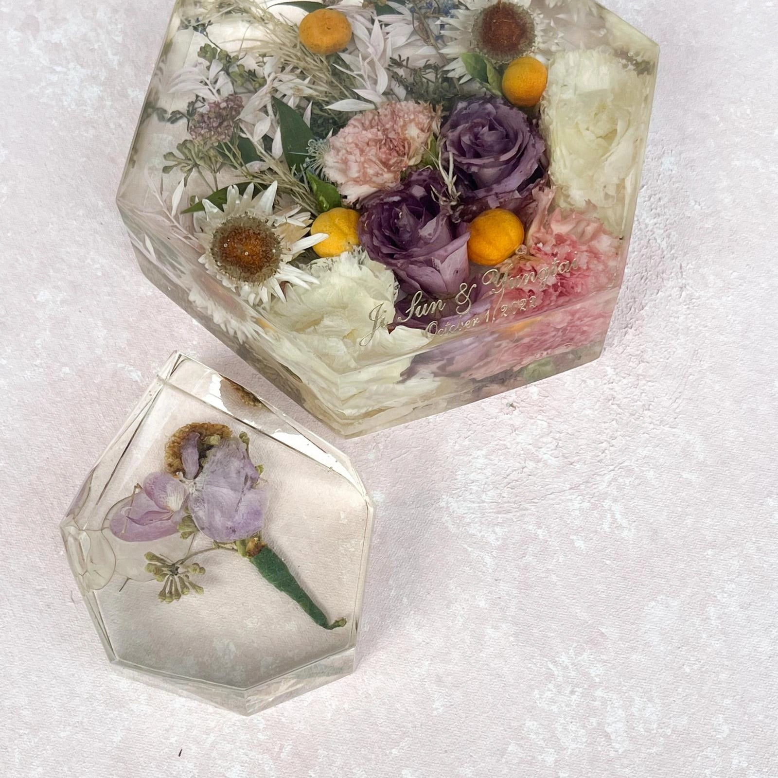 Multifaceted Resin Floral Preservation Block featuring a custom wedding bouquet preserved in crystal-clear resin for home decor.