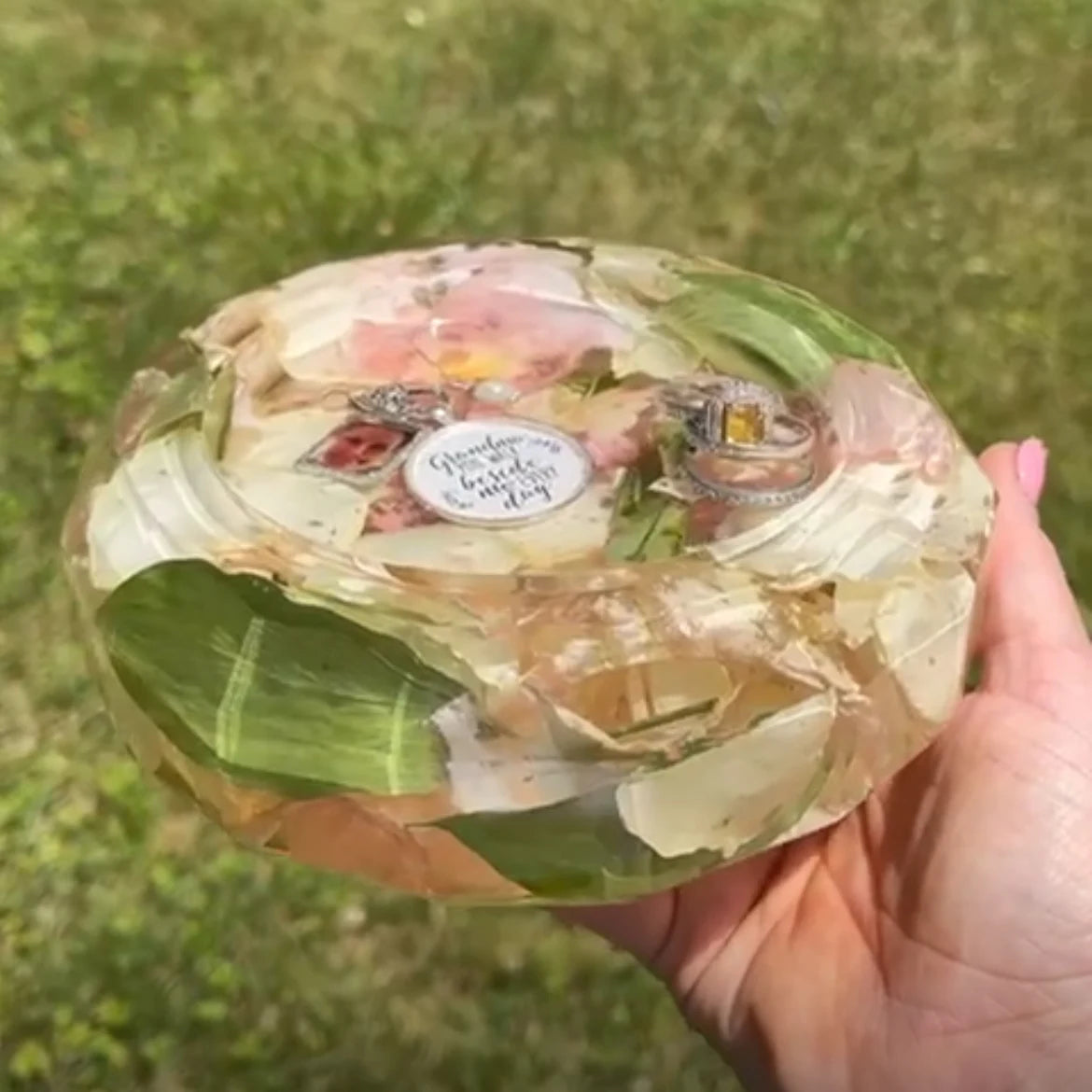 Resin Floral Preservation Trinket Dish holding small jewelry items with custom wedding bouquet fragments.