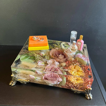 Resin Floral Preservation Vanity Tray with brass claw feet holding bridal jewelry alongside preserved wedding flowers.