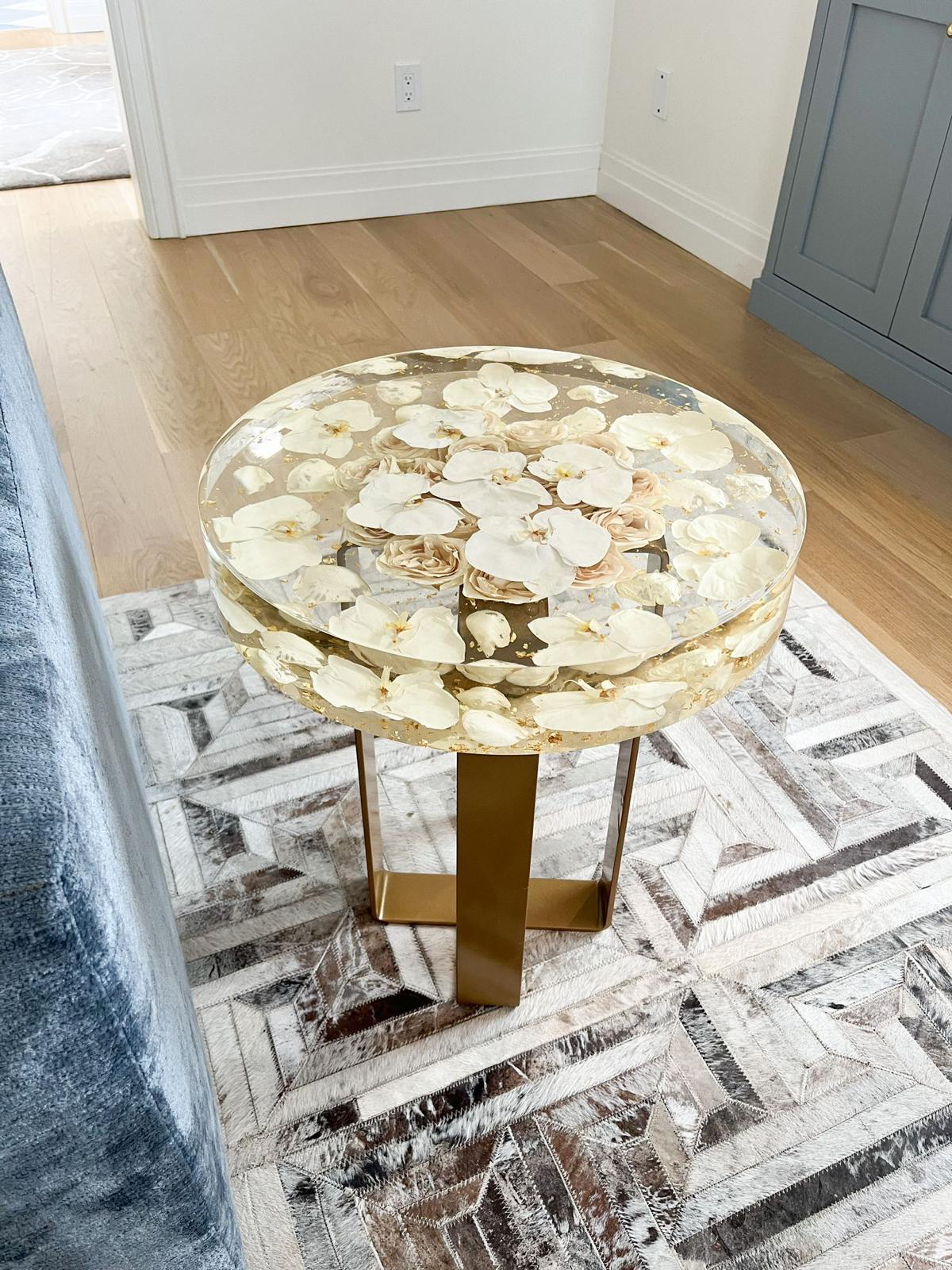 Resin Floral Preservation Side Table with metal legs showcasing custom preserved wedding flowers for living room decor.
