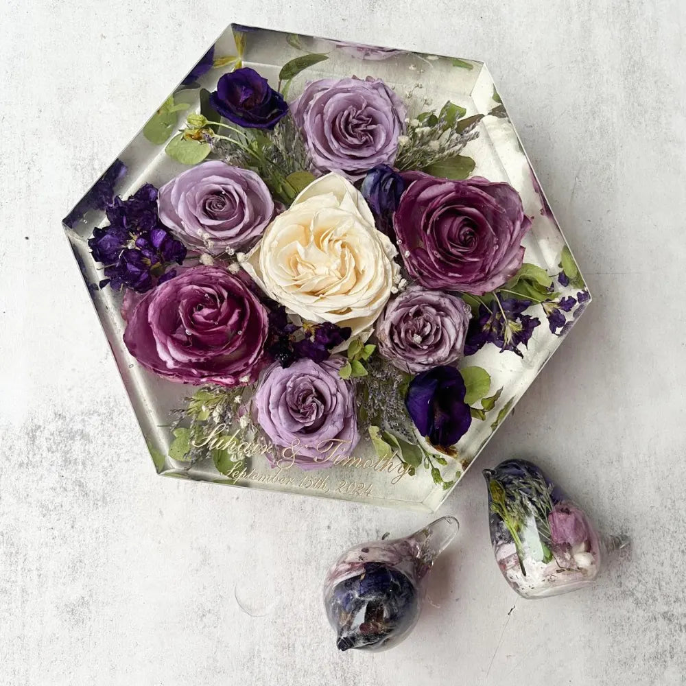 Geometric Hexagon Resin Floral Preservation Block displaying a vibrant custom wedding bouquet from all angles.
