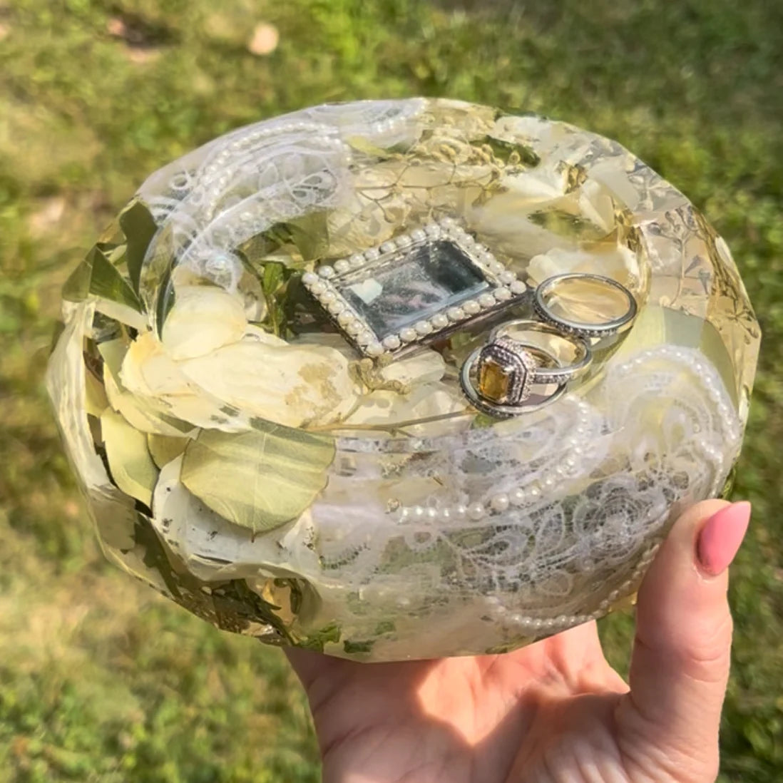 Resin Floral Preservation Trinket Dish holding small jewelry items with custom wedding bouquet fragments.