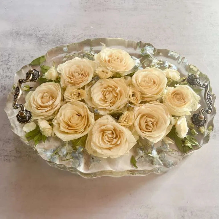 Resin Floral Preservation Display Tray with handles showing preserved wedding bouquet fragments for coffee table styling.