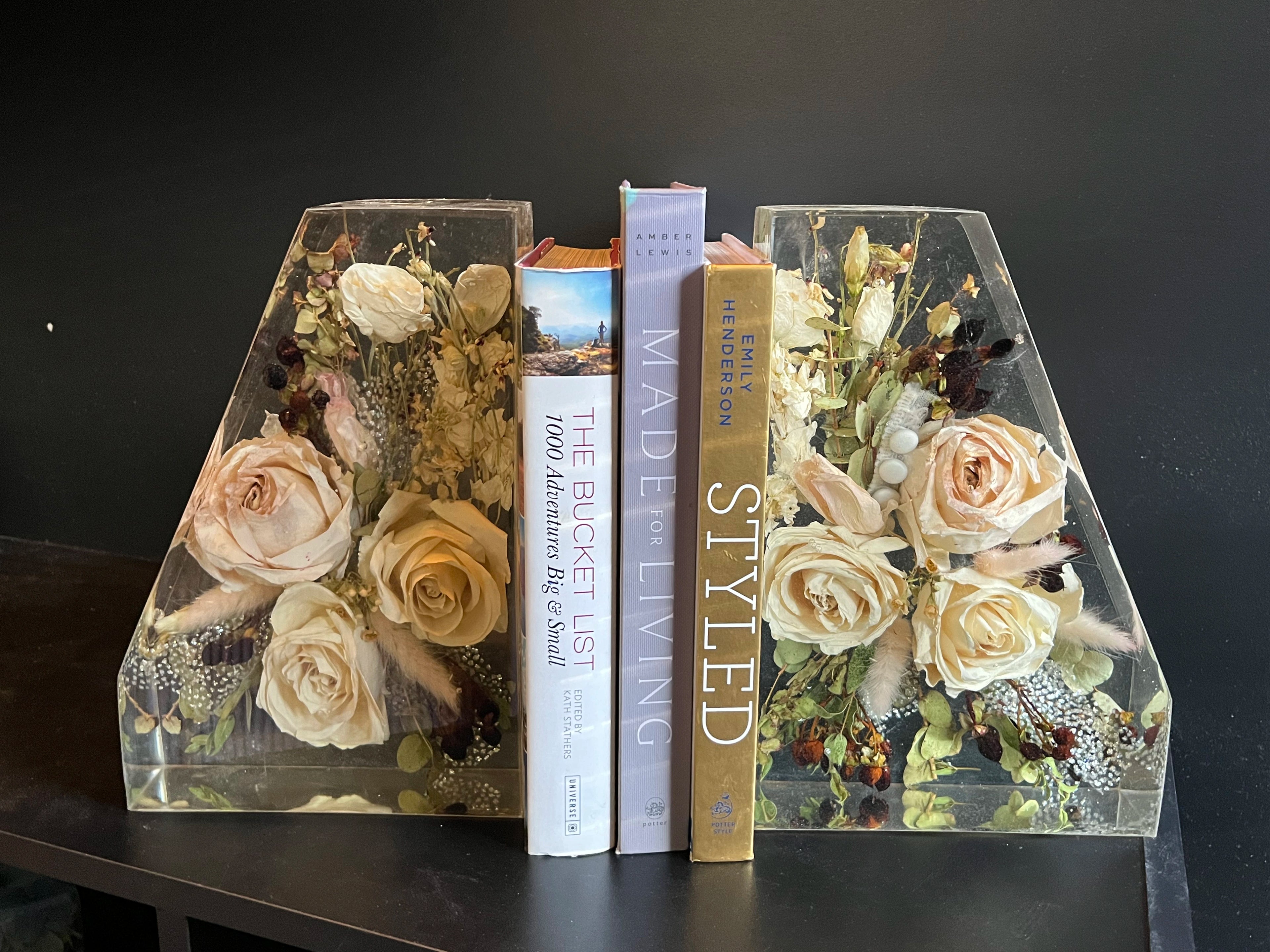 Resin Floral Preservation Straight Edge Bookends organizing a bookshelf with preserved wedding flowers inside.