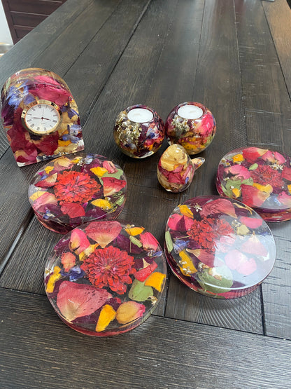 Set of Resin Floral Preservation Coasters protecting a table surface with custom wedding flowers embedded.