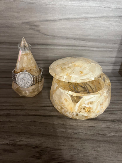 Resin Floral Preservation Jewelry Box storing wedding rings and mementos among preserved bouquet petals.