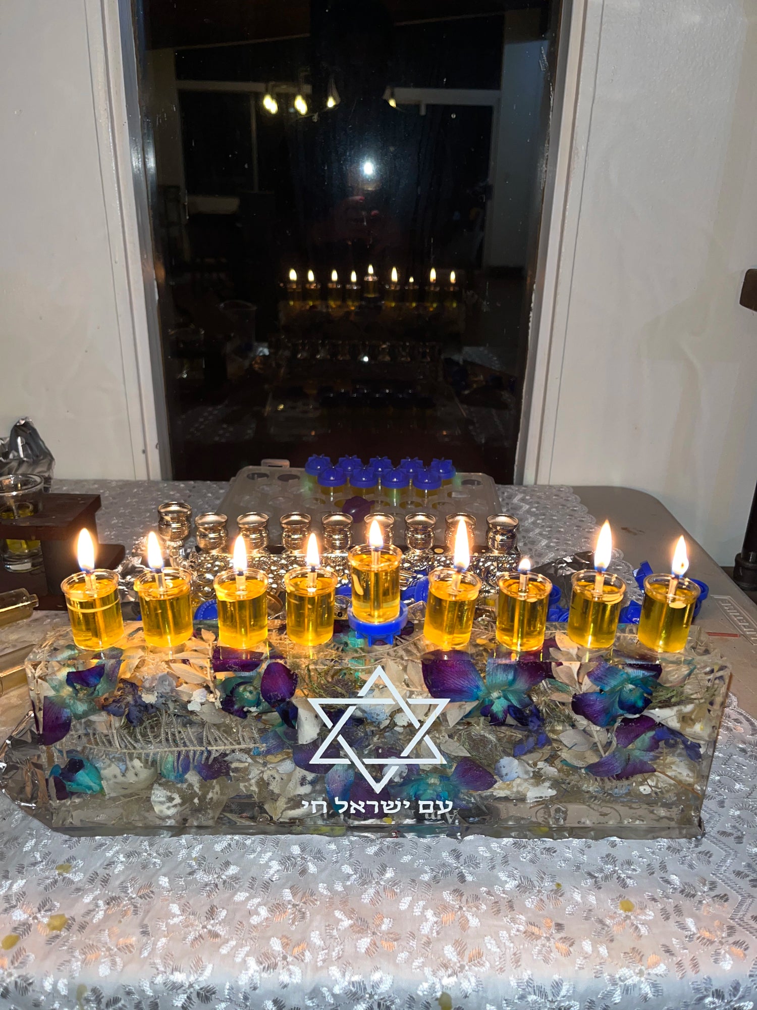 Custom Resin Floral Preservation Menorah handcrafted with colorful wedding bouquet petals for a Jewish wedding keepsake.