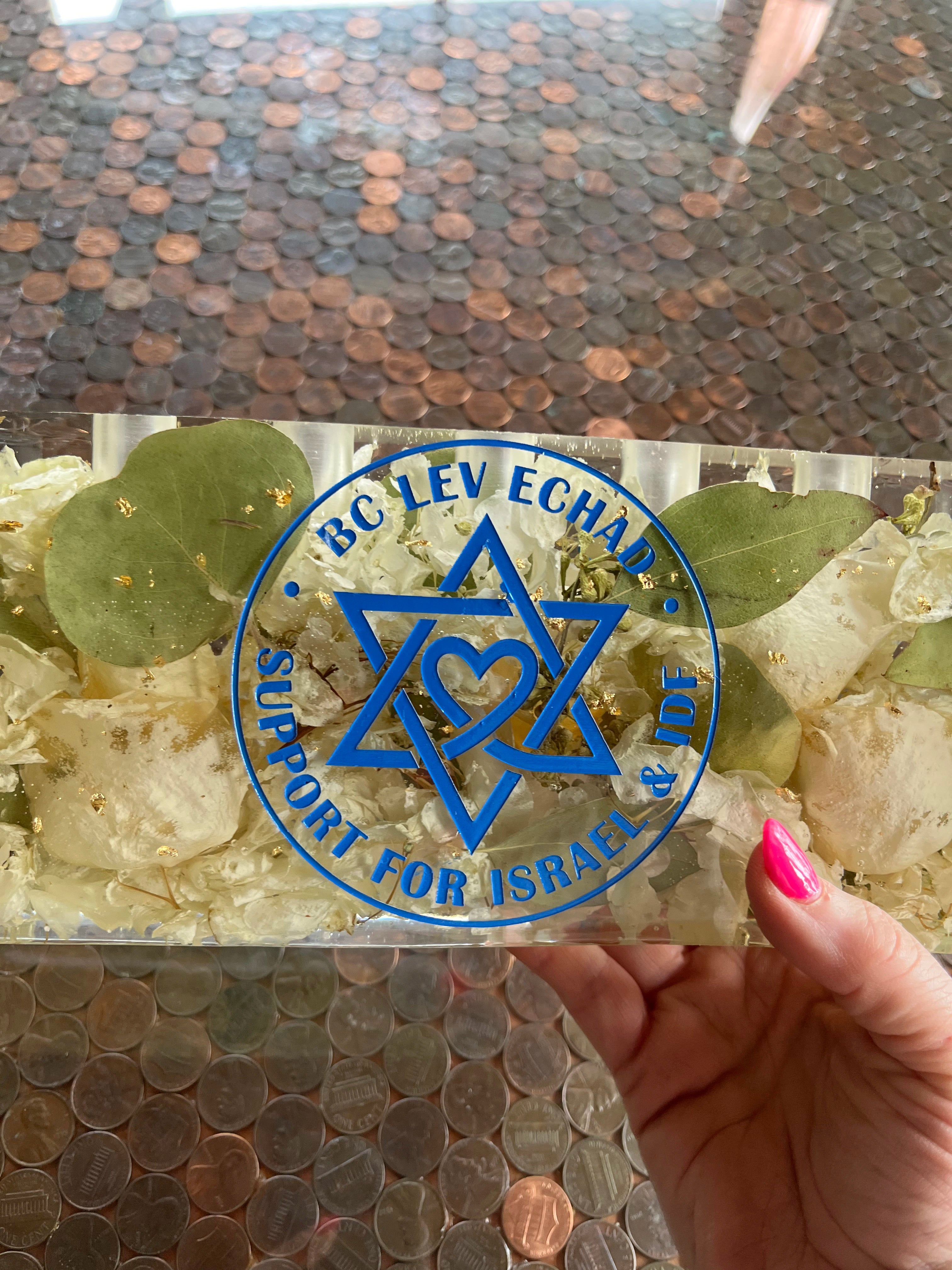 Custom Resin Floral Preservation Menorah handcrafted with colourful wedding bouquet petals for a Jewish wedding keepsake.