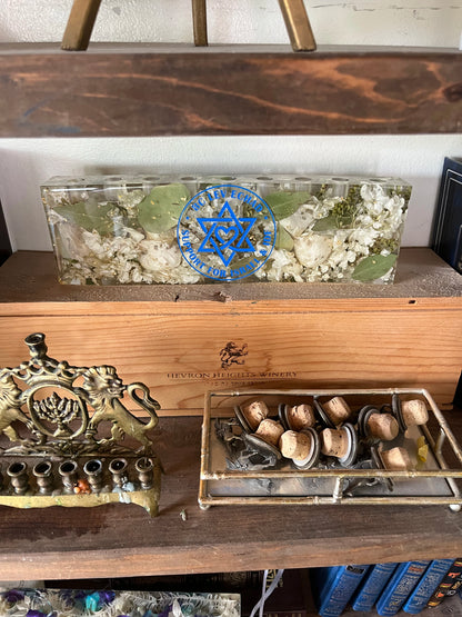 Custom Resin Floral Preservation Menorah handcrafted with colorful wedding bouquet petals for a Jewish wedding keepsake.
