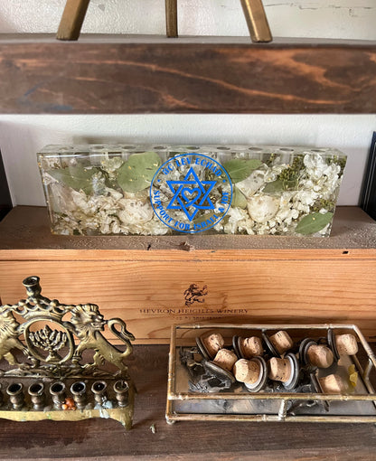 Custom Resin Floral Preservation Menorah handcrafted with colorful wedding bouquet petals for a Jewish wedding keepsake.