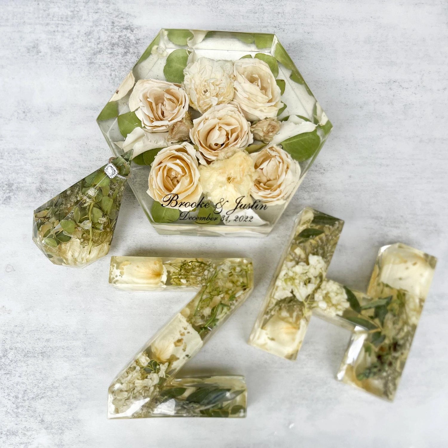 Custom Resin Floral Preservation Letter displaying wedding flowers in a personalized monogram shape.