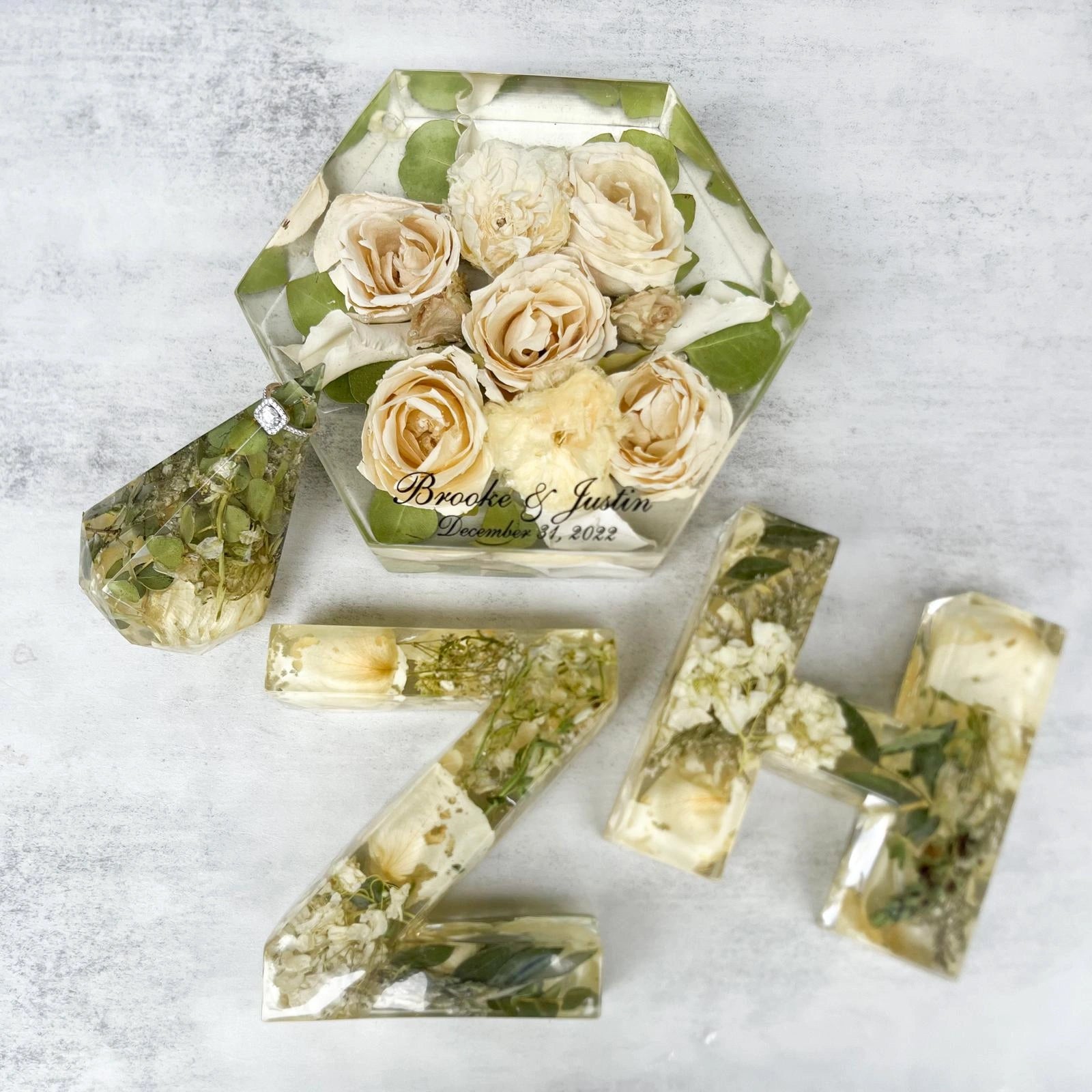 Custom Resin Floral Preservation Letter displaying wedding flowers in a personalized monogram shape.