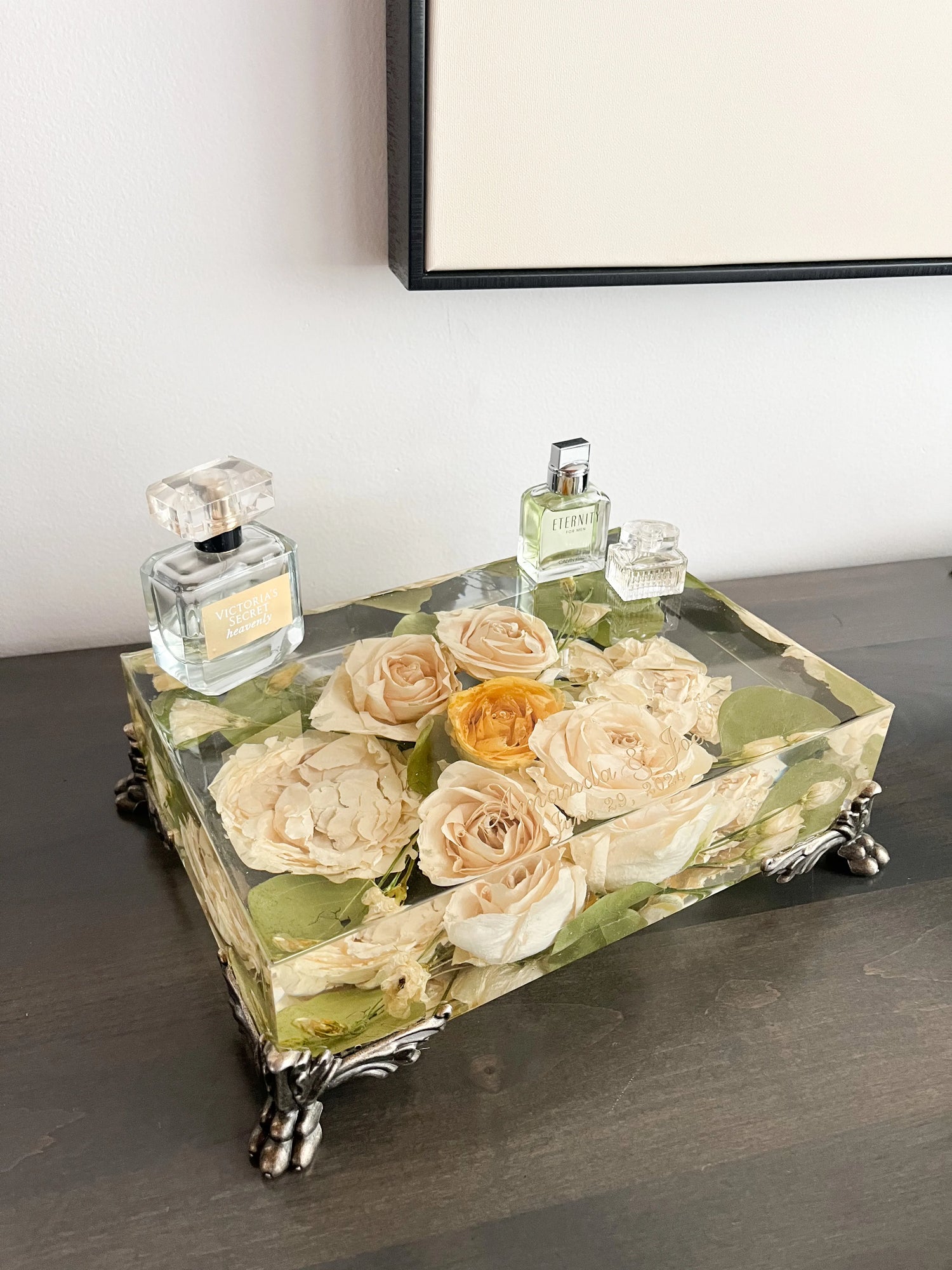 Resin Floral Preservation Vanity Tray with brass claw feet holding bridal jewelry alongside preserved wedding flowers.