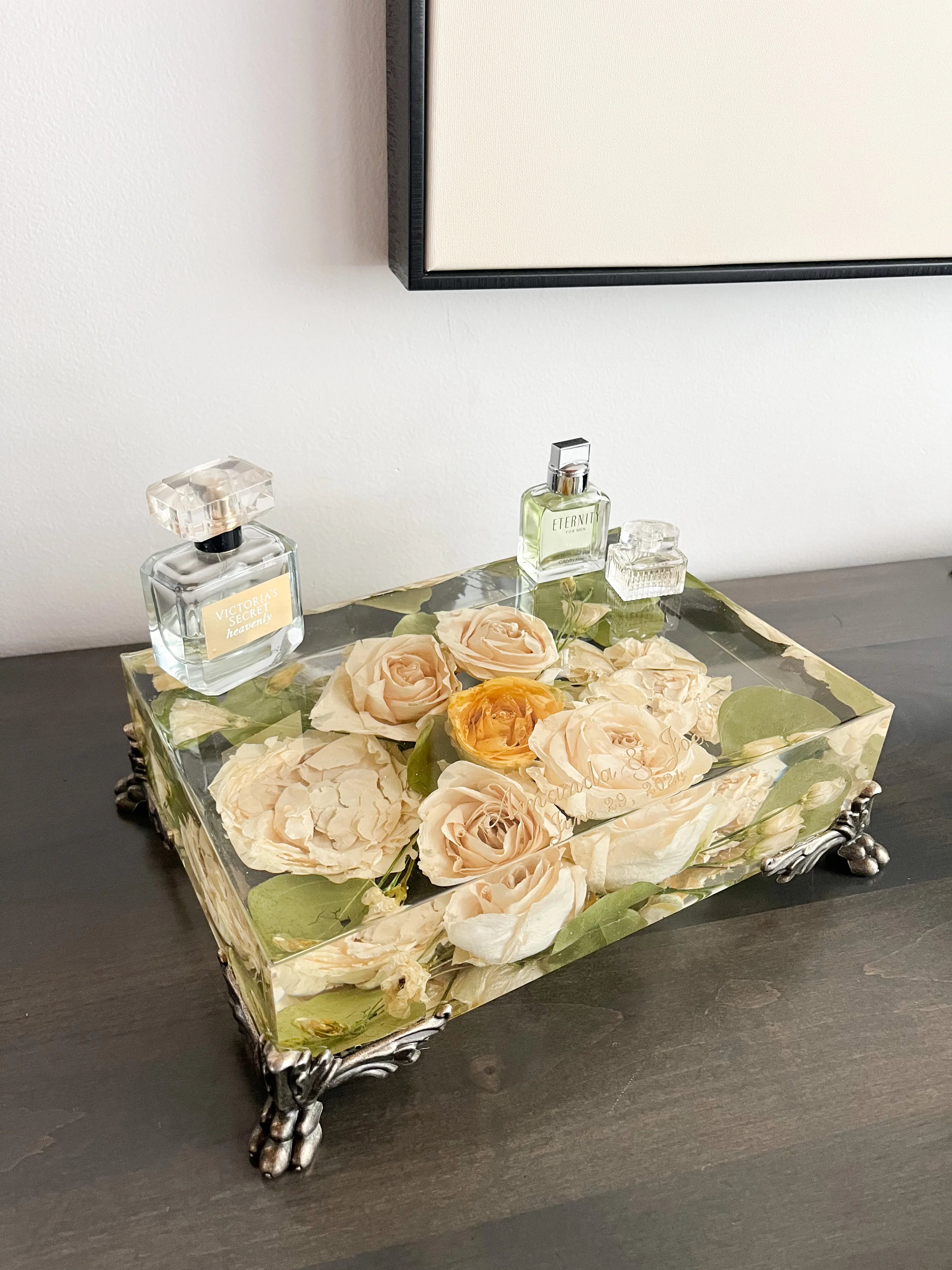 Resin Floral Preservation Vanity Tray with brass claw feet holding bridal jewelry alongside preserved wedding flowers.