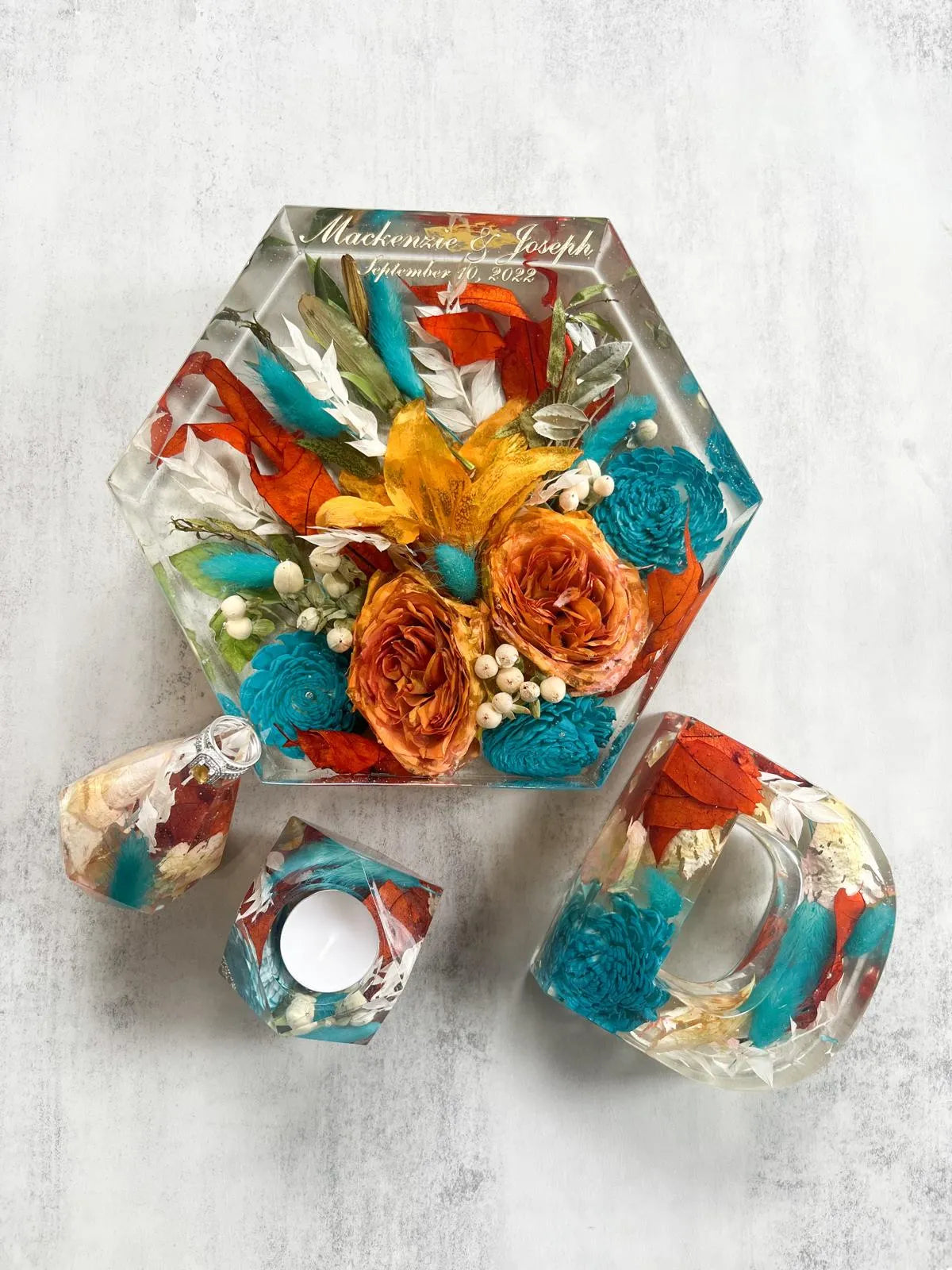 Geometric Hexagon Resin Floral Preservation Block displaying a vibrant custom wedding bouquet from all angles.