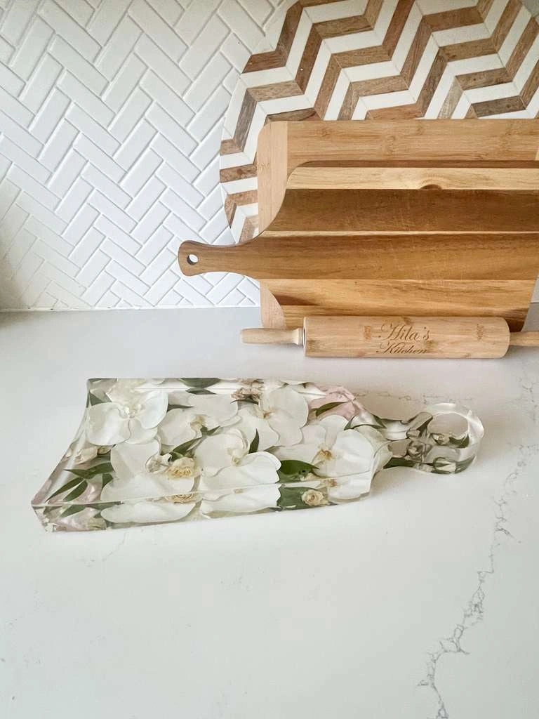 Resin Floral Preservation Charcuterie Board displaying wedding flowers in a functional serving tray.