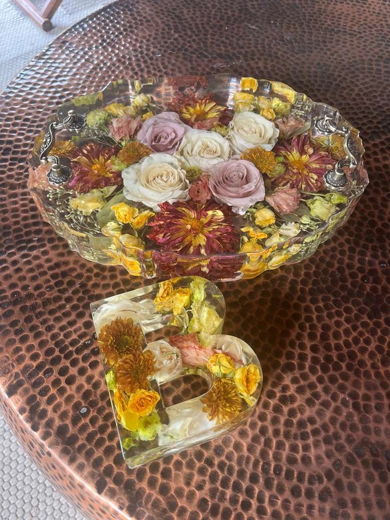 Resin Floral Preservation Display Tray with handles showing preserved wedding bouquet fragments for coffee table styling.