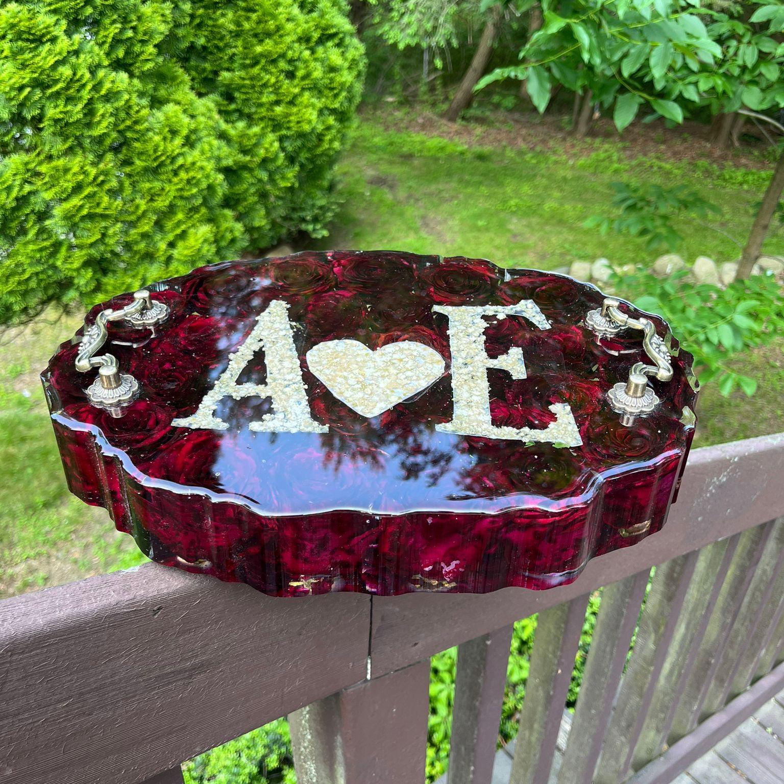 Resin Floral Preservation Display Tray with handles showing preserved wedding bouquet fragments for coffee table styling.