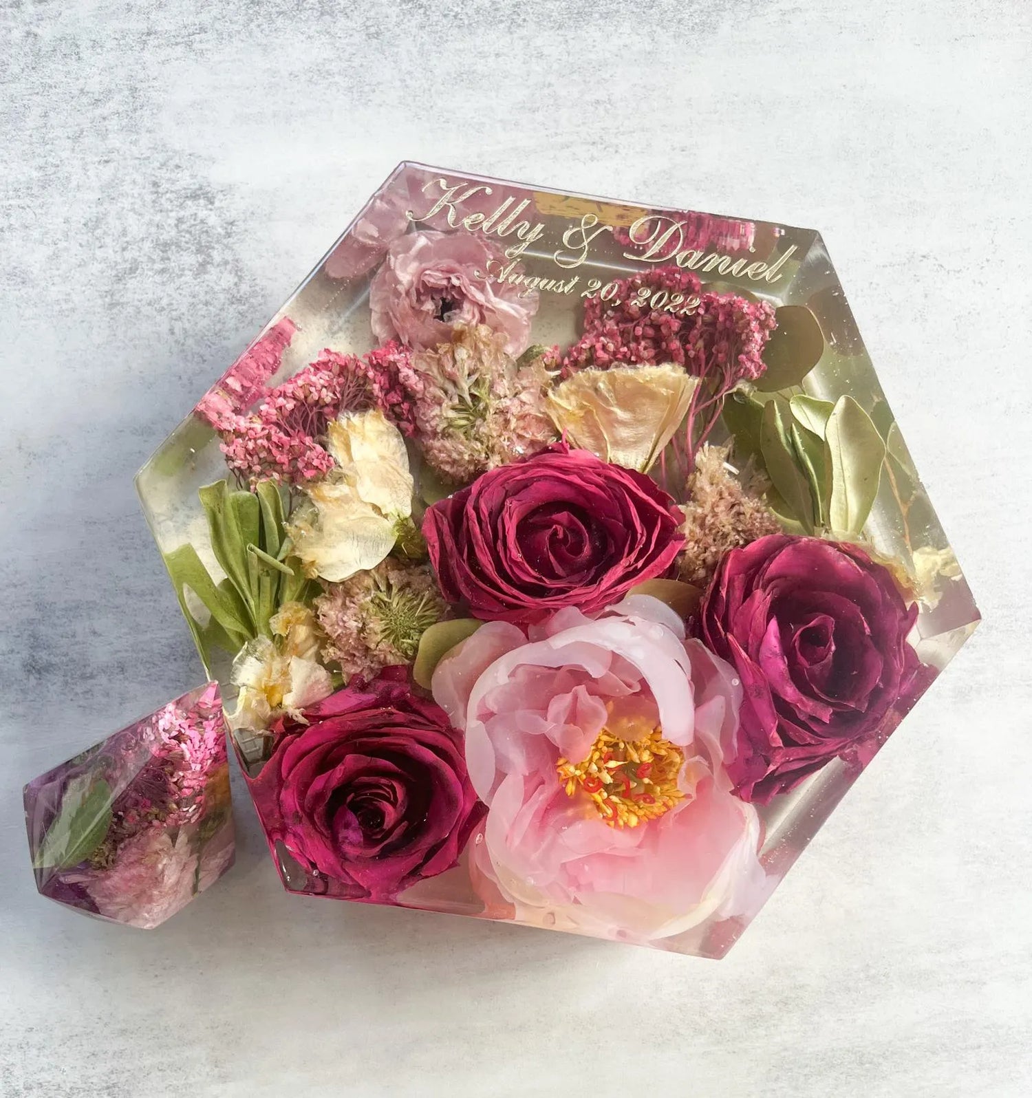 Geometric Hexagon Resin Floral Preservation Block displaying a vibrant custom wedding bouquet from all angles.
