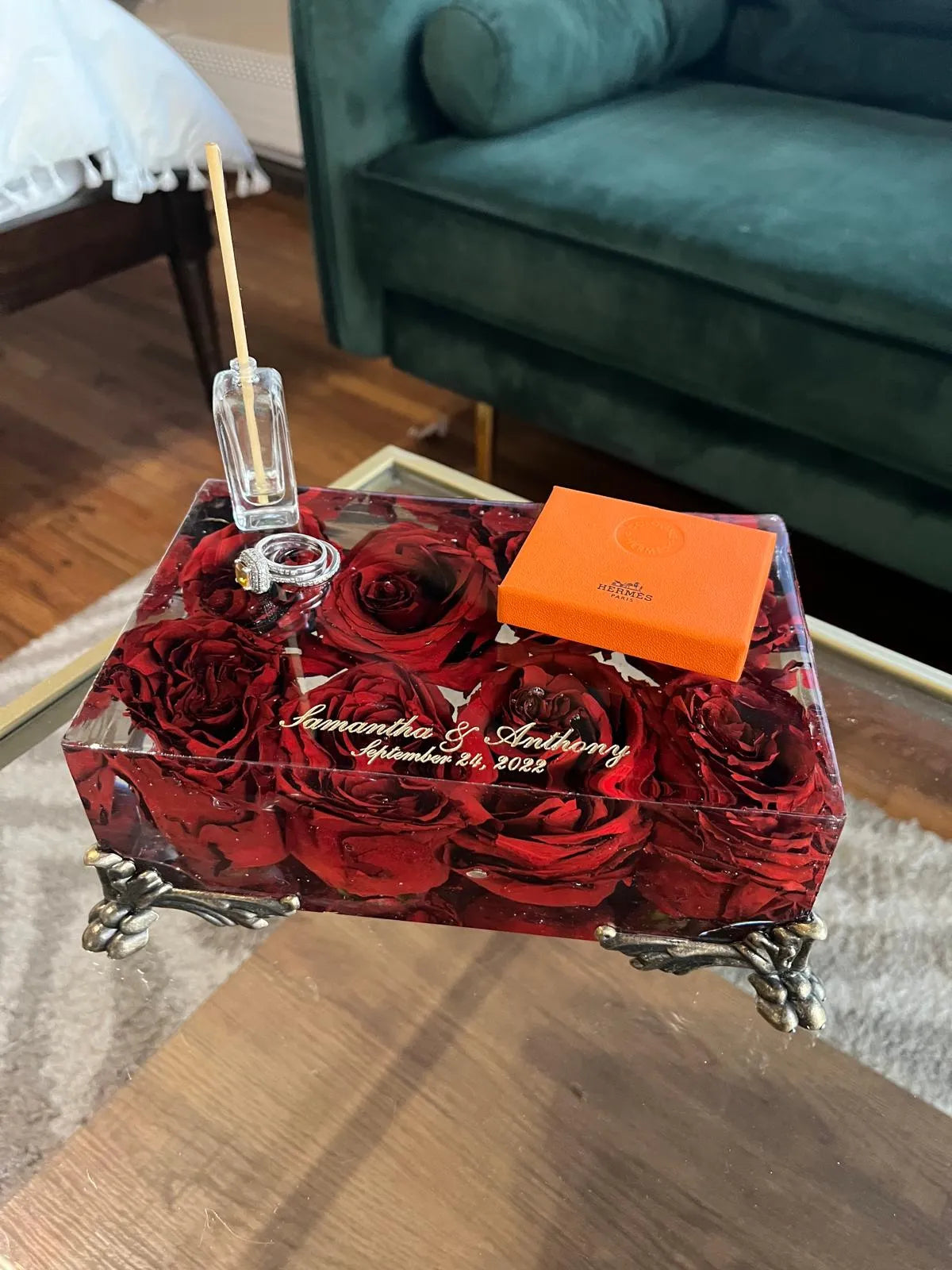 Resin Floral Preservation Vanity Tray with brass claw feet holding bridal jewelry alongside preserved wedding flowers.