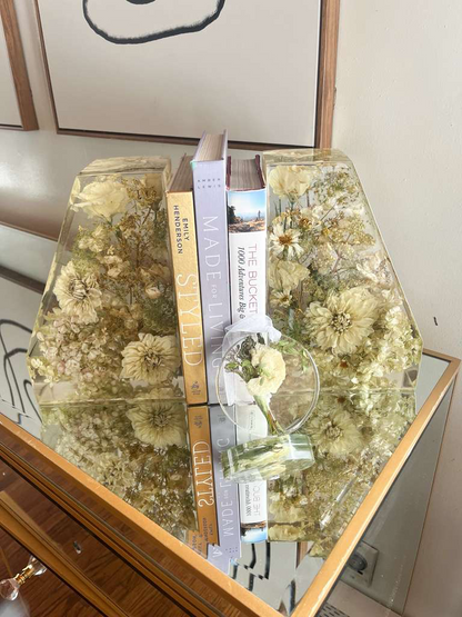 Resin Floral Preservation Straight Edge Bookends organizing a bookshelf with preserved wedding flowers inside.