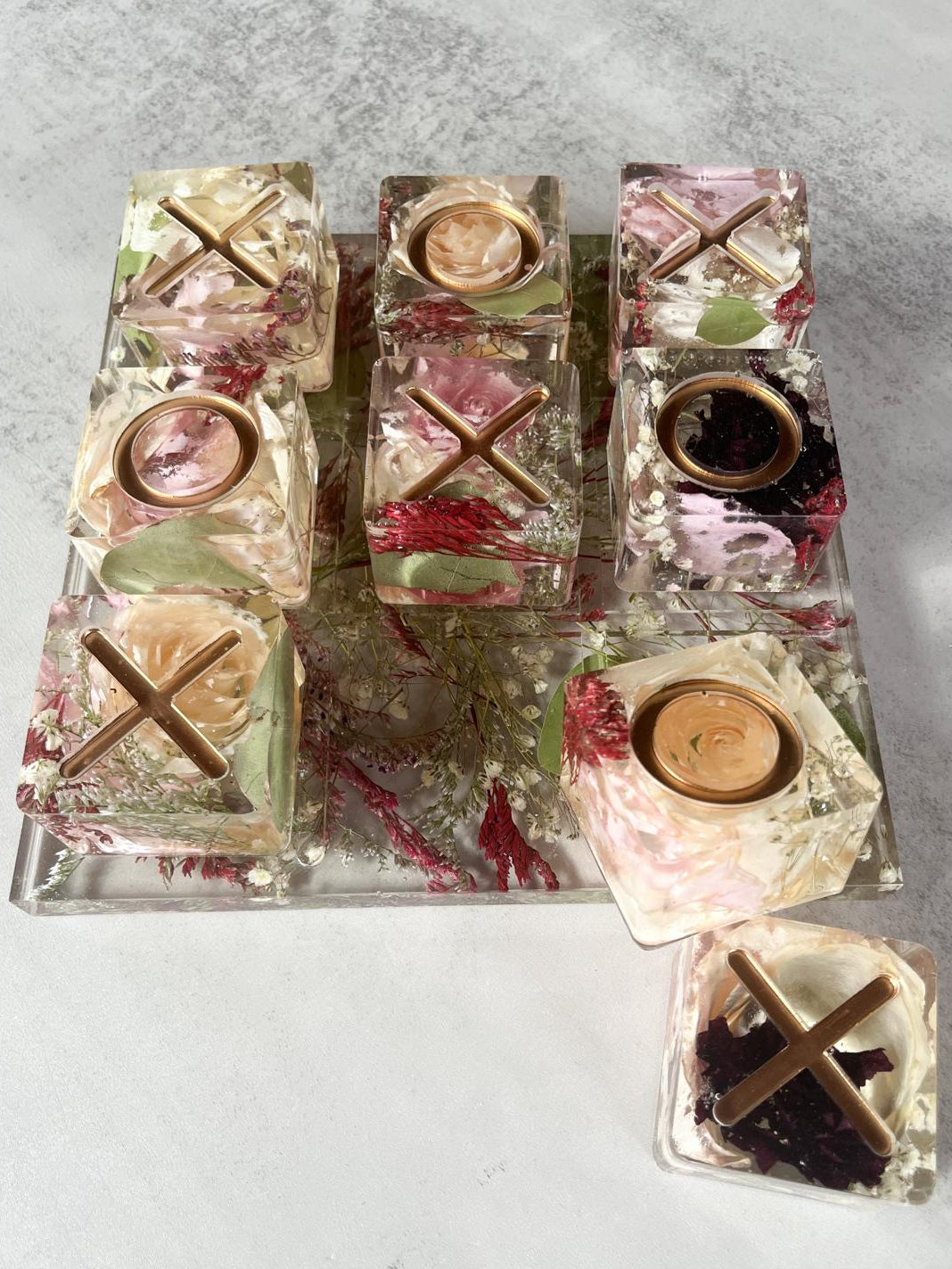 Resin Floral Preservation Tic-Tac-Toe Set featuring real wedding flowers embedded in a functional game board.